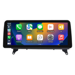 Movyro Android Car Stereo for BMW X5 X6 2006-2014 E70 E71 with CarPlay and Android Auto display in a vehicle dashboard
